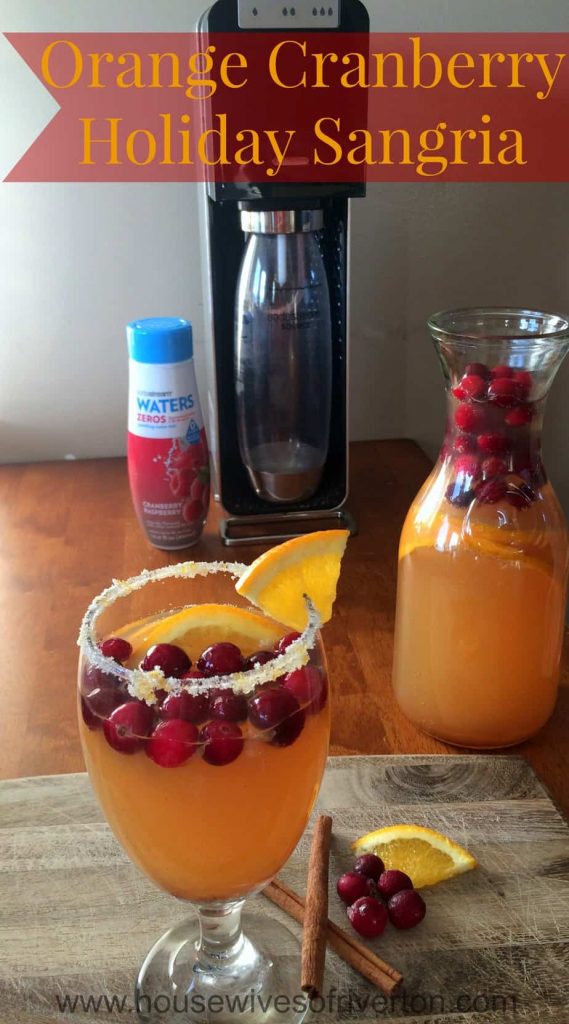 Orange Cranberry Holiday Sangria is a great, non alcoholic drink for the whole family! #ad #WaterMadeExciting | www.housewivesofriverton.com