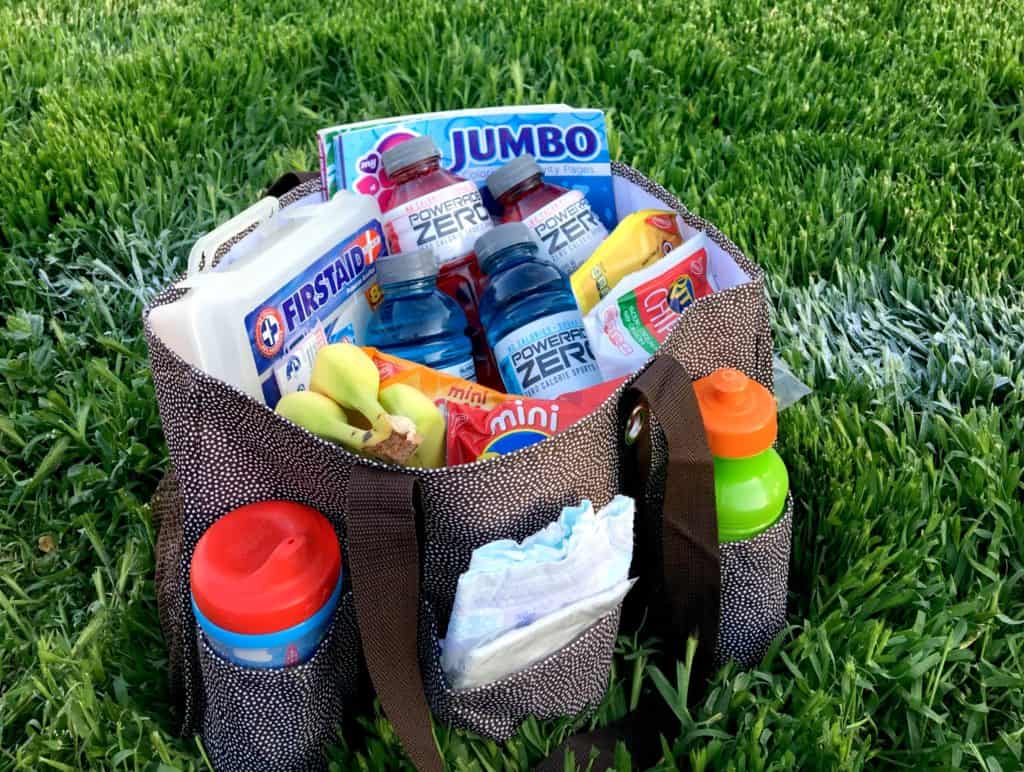 When your kids' sports are taking over you life, use these 5 ways to make your sideline life easier! Plan and prepare to make everything run smoothly! | www.housewivesofriverton.com