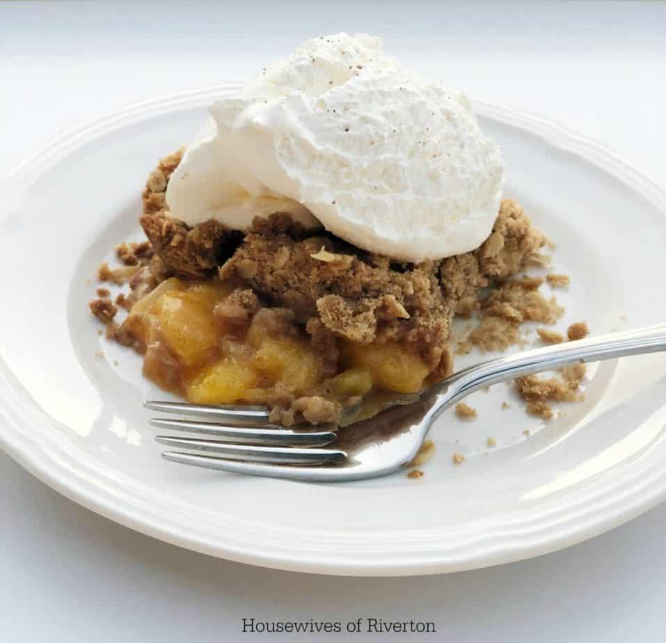Our Fresh Peach Crumble is going to hit the spot for your fall dessert! | www.housewivesofriverton.com